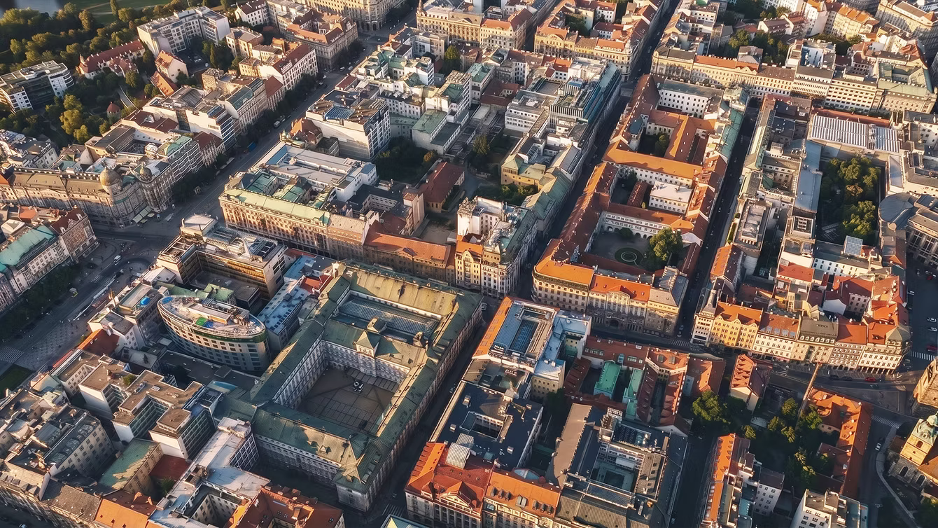 Aerial view of a dense city grid at golden hour