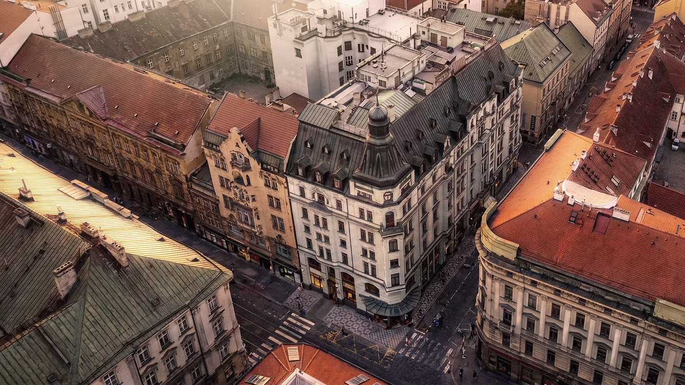 Aerial view of ornate rooftops on a busy city crossroads